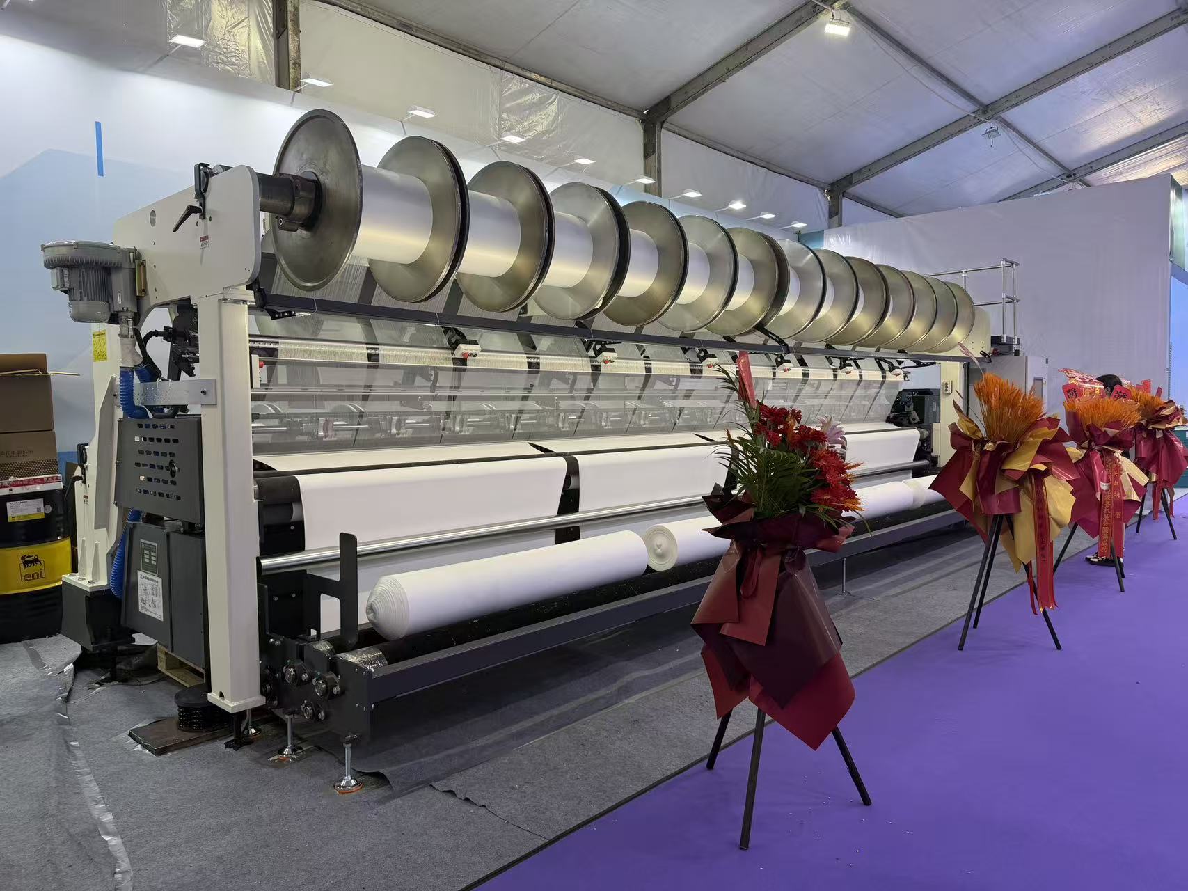 A-ZEN Launches Upgraded HTS3EL 290" E32 Warp Knitting Machine at Haining Textile Fair 2026